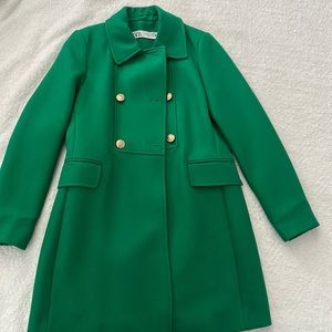 Tailored coat with gold buttons